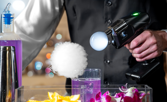 mixologist making aromatic bubbles