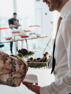 Event staff serving food with care