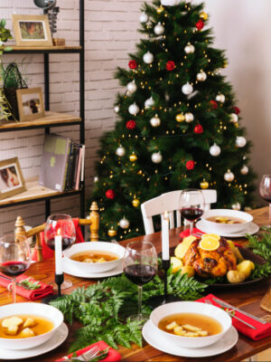 Festive table setting with Christmas tree